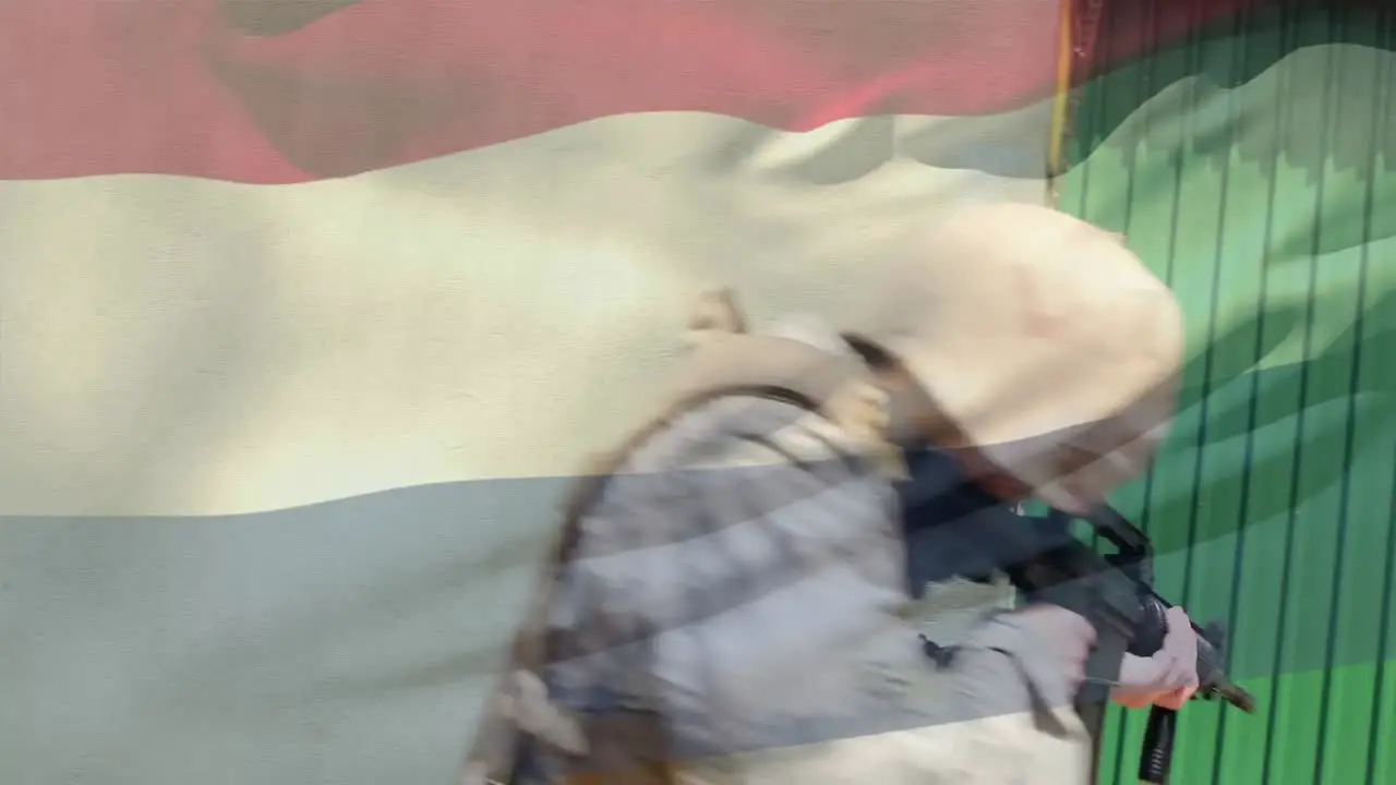 Digital composition of waving netherlands flag against soldier training with a gun at training camp