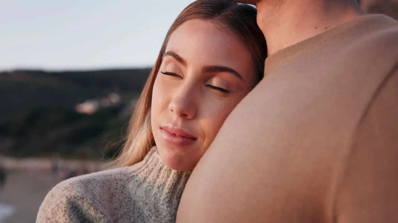 Couple hug and view with peace at the beach