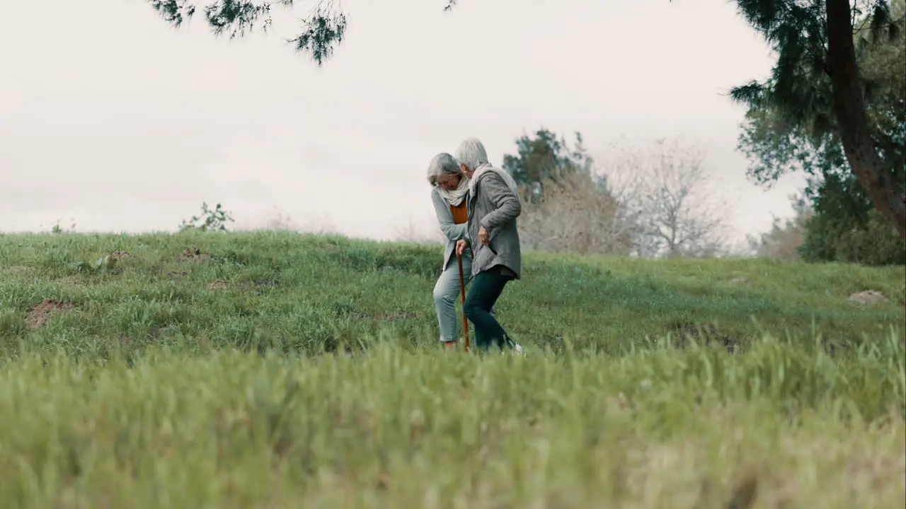 Senior woman friends and walking in park