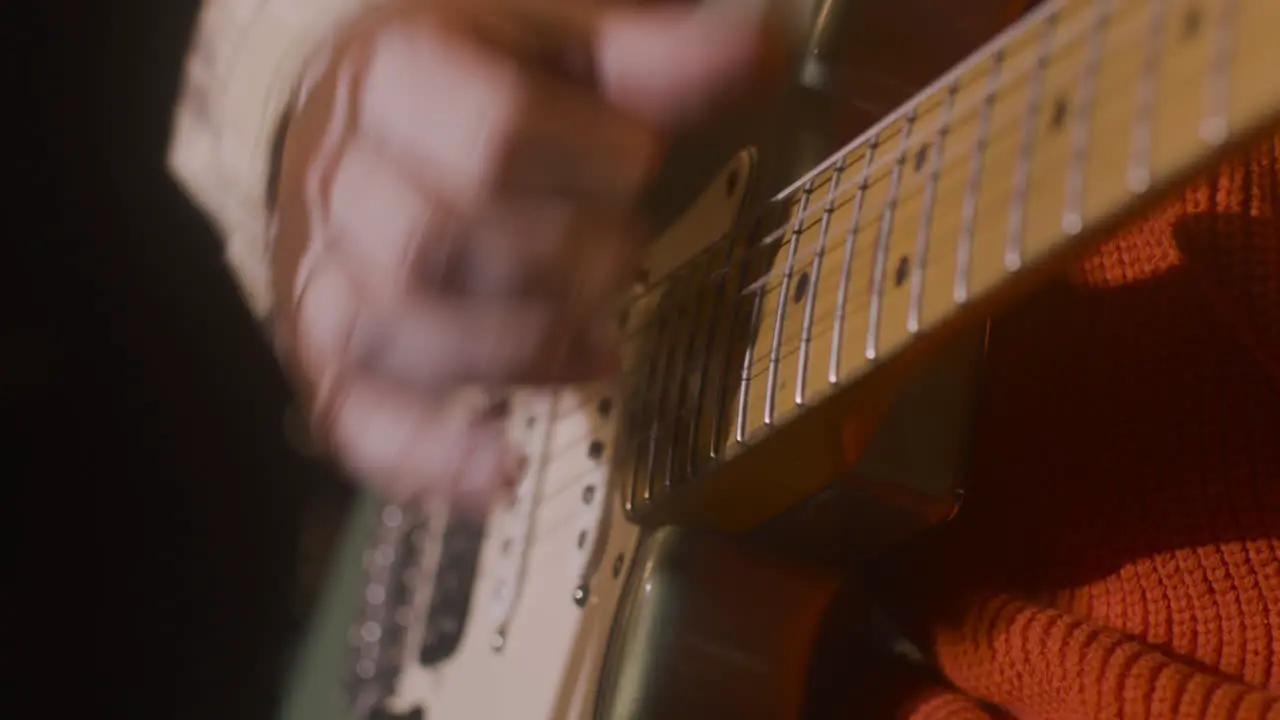 Close Up Of An Unrecognizable Male Musician Playing Guitar 2