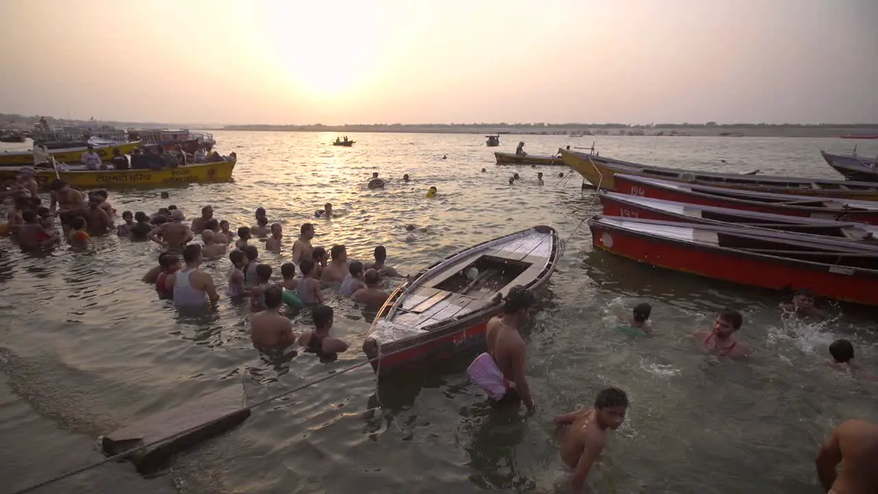 People in the Ganges at Sundown