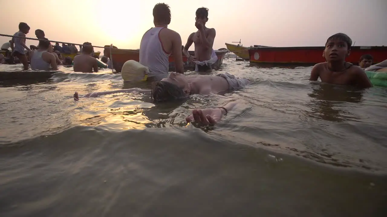 Children Playing in River Ganges at Sunset