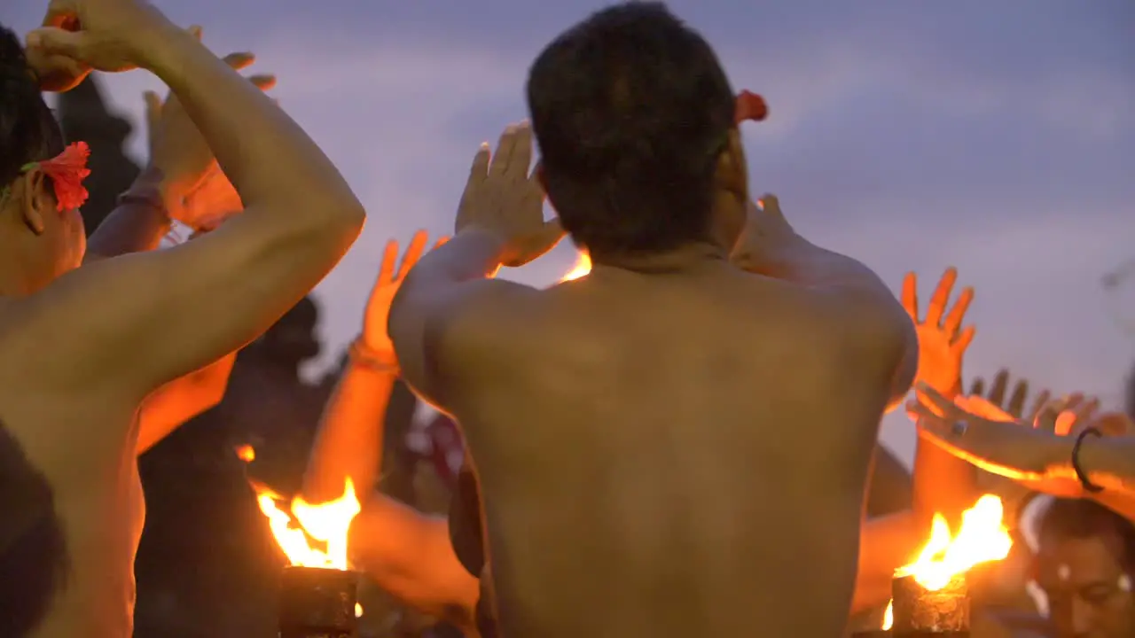 Men Chanting the Kecak by a Fire at Dusk