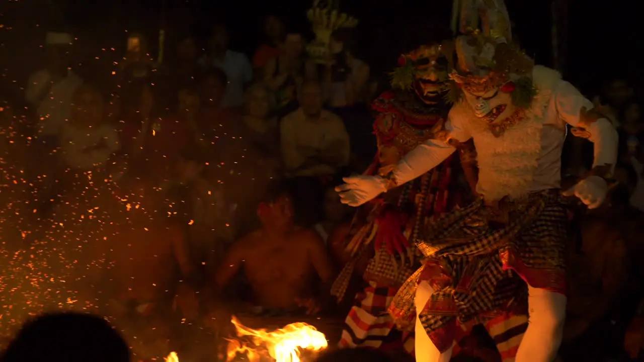 Men in Traditional Costumes Perform the Kecak