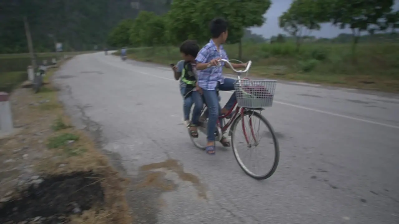 Vietnamese Children Riding a Bike