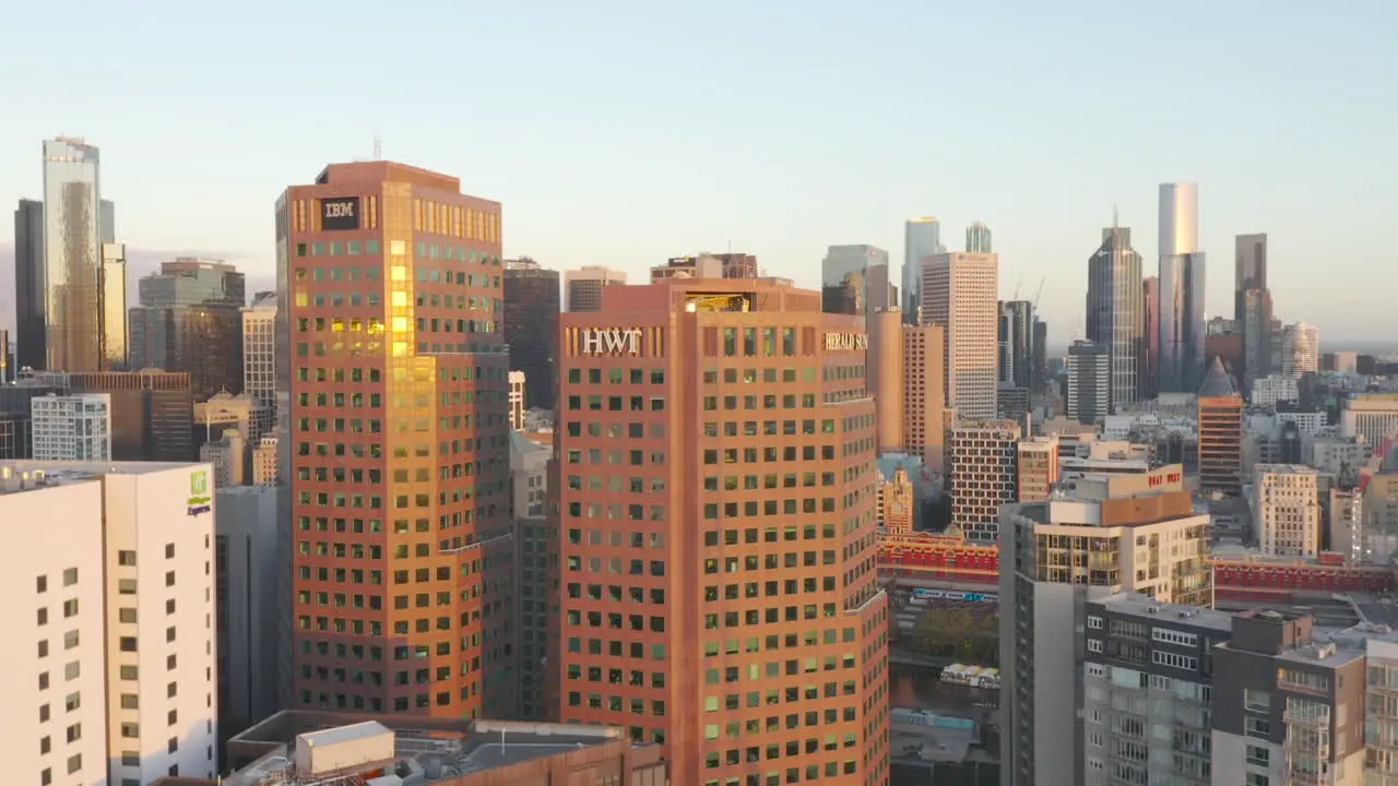 Aerial accent looking over Melbourne CBD with classic architecture in the foreground during beautiful dawn morning