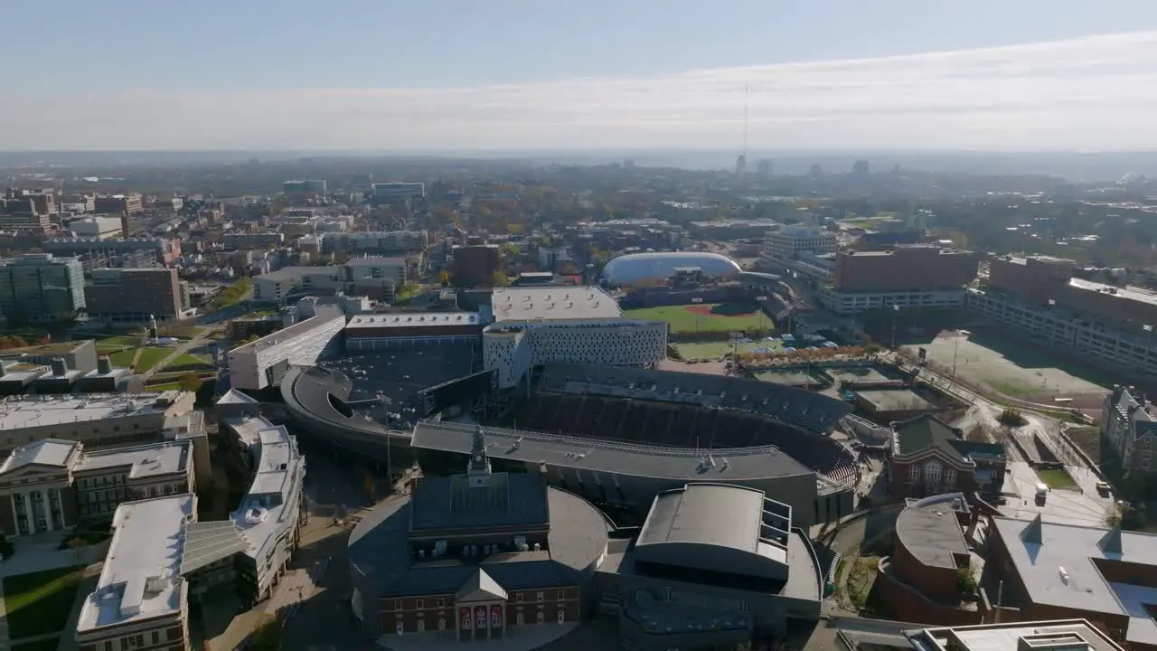 Aerial view away from the Nippert Stadium and the University of Cincinnati USA pull back drone shot