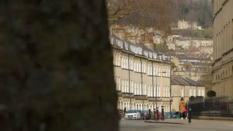 Tracking Shot Past Tree Revealing Henrietta Street