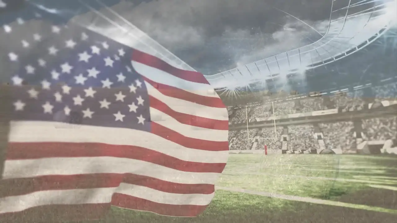 Digital composition of waving american flag against sports stadium in background