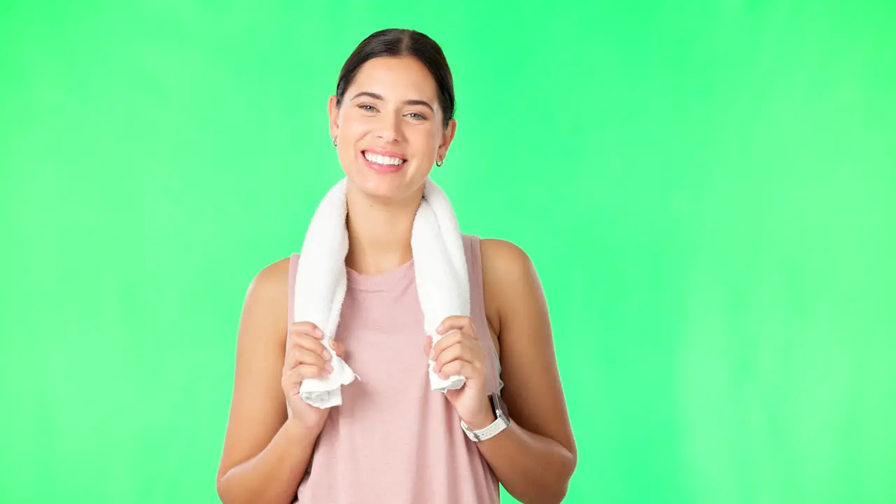 Green screen towel and face of fitness woman