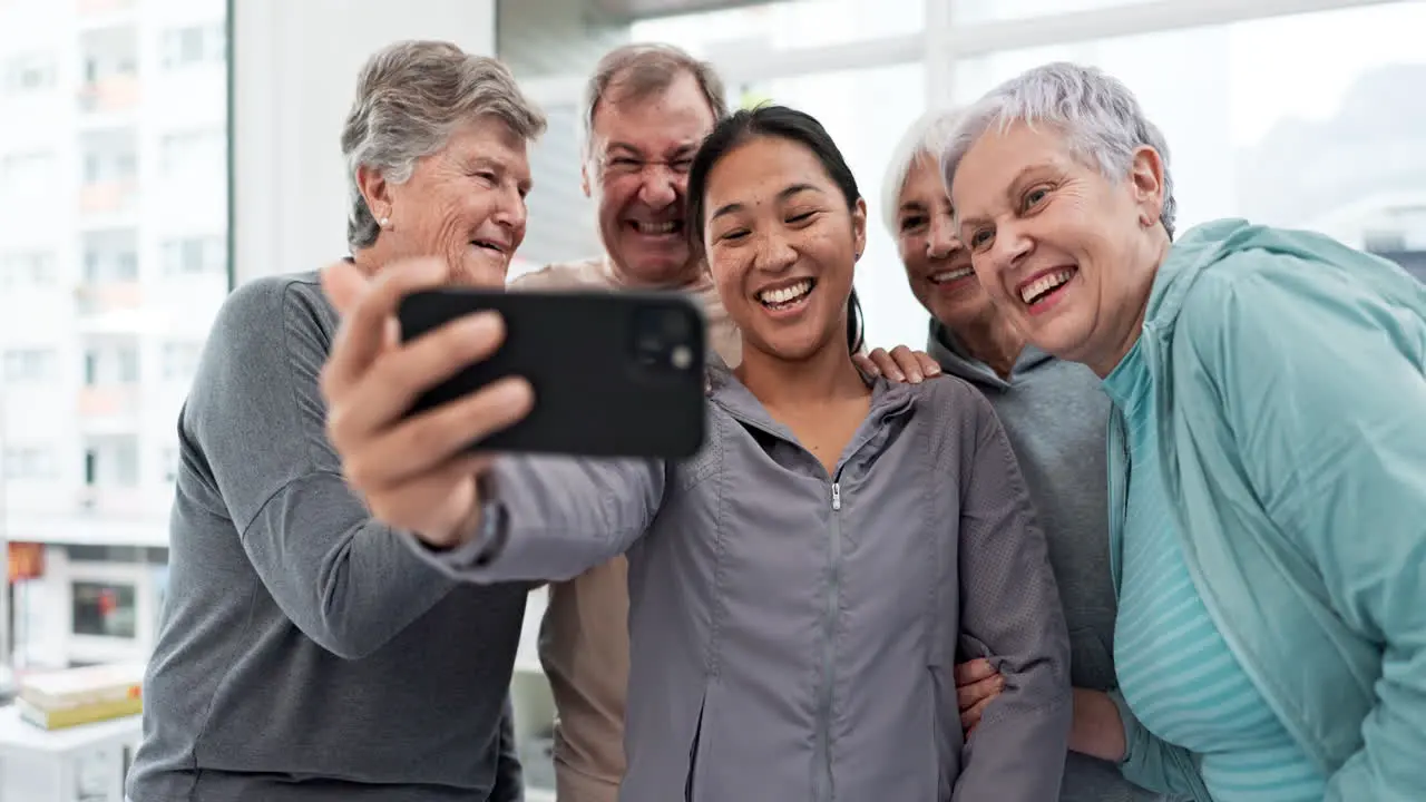 Elderly friends selfie and smile in fitness group