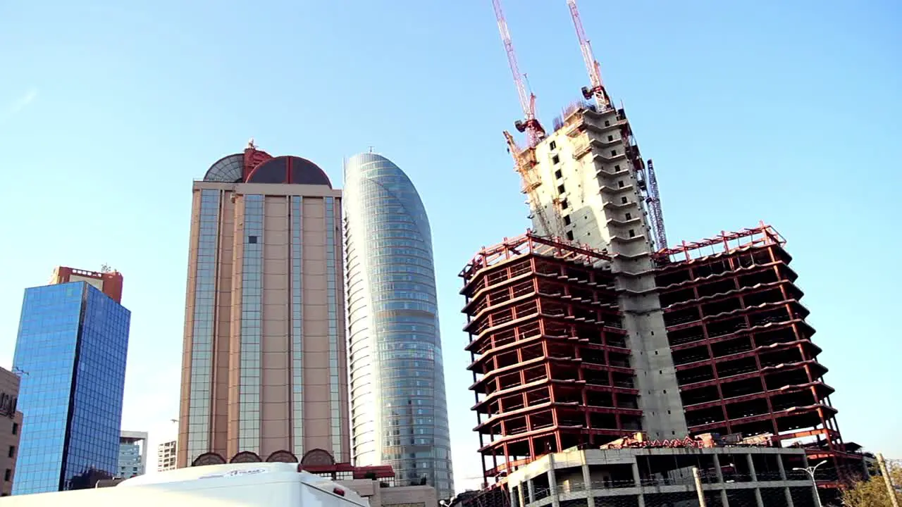 City Commuting Independently Between Glass Buildings Building And Suny Sky 2