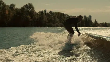 Wakeboarder falling in water Surfer falling in slow motion Man wake surfing