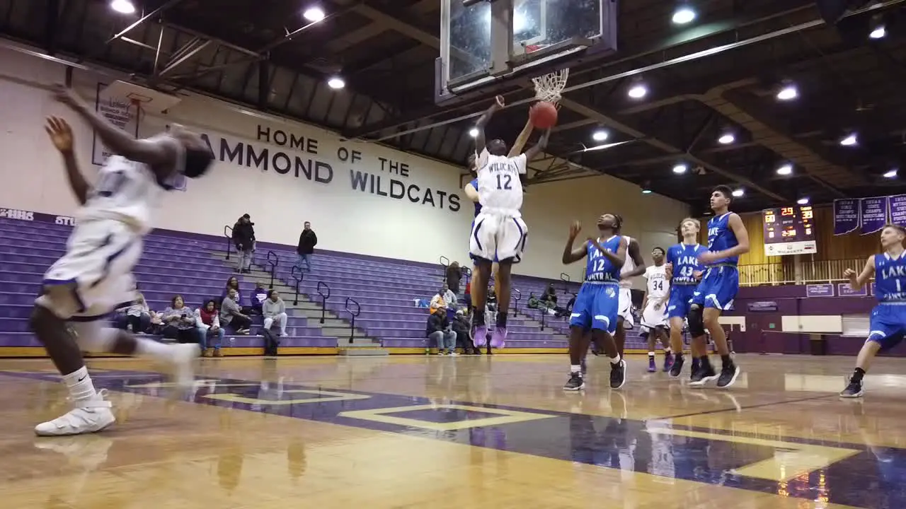 High School basketball player making a layup