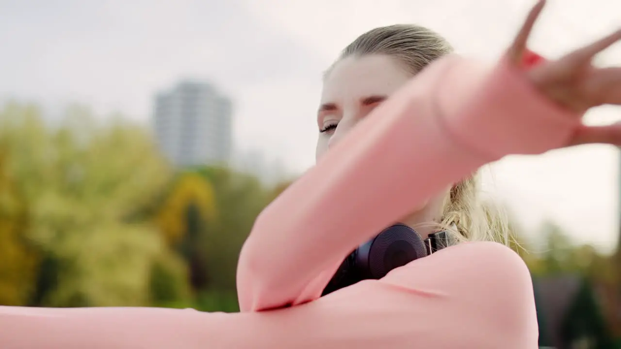 Handheld view of woman starting up her jogging training