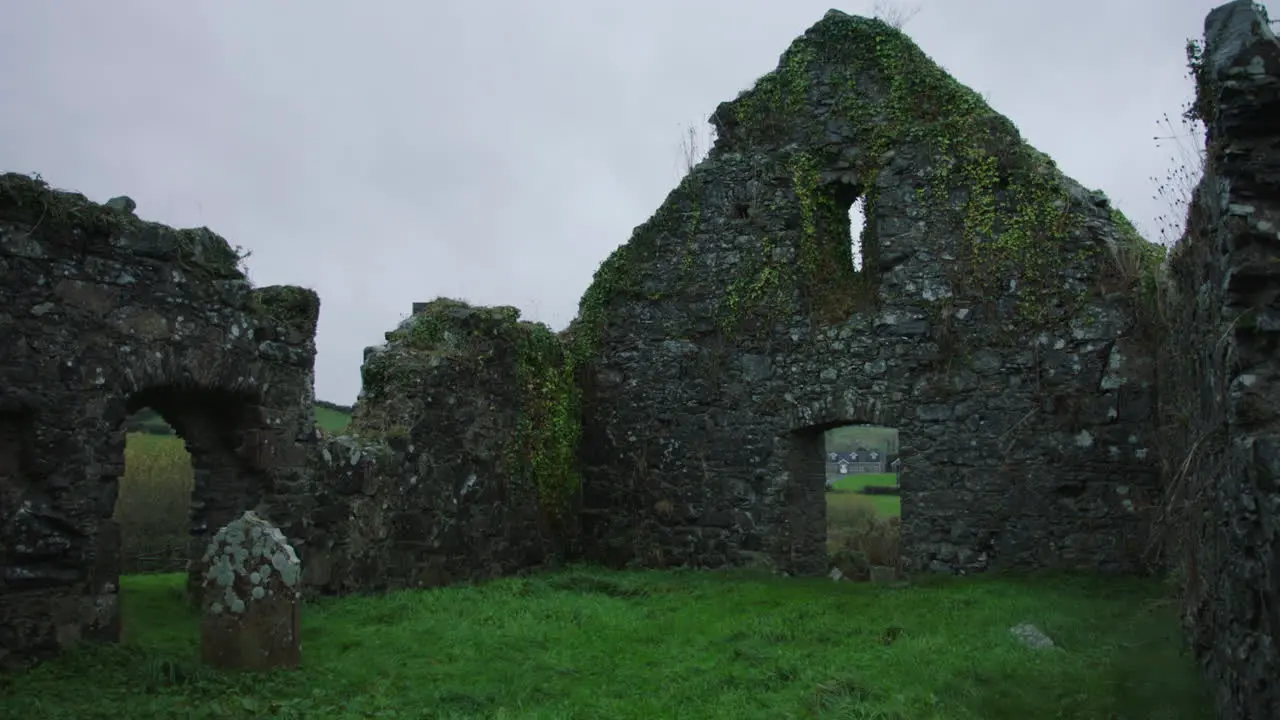 Ruin Of An Old Stone Church With Graves Ireland