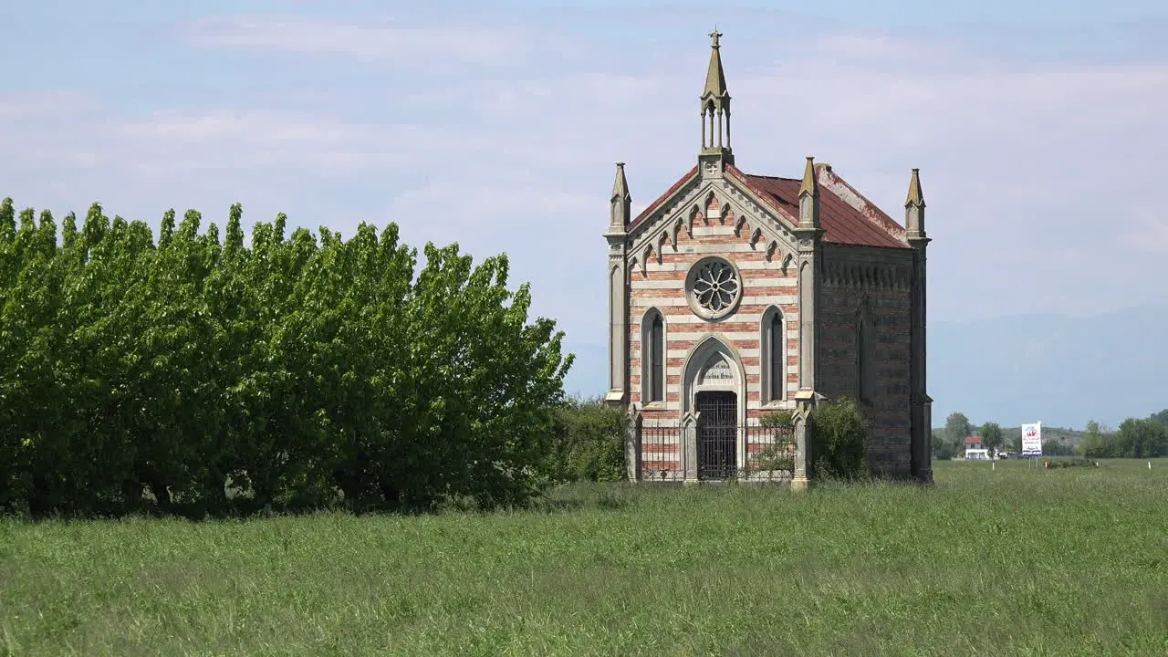 Italy Small Chapel By A Grove Of Trees