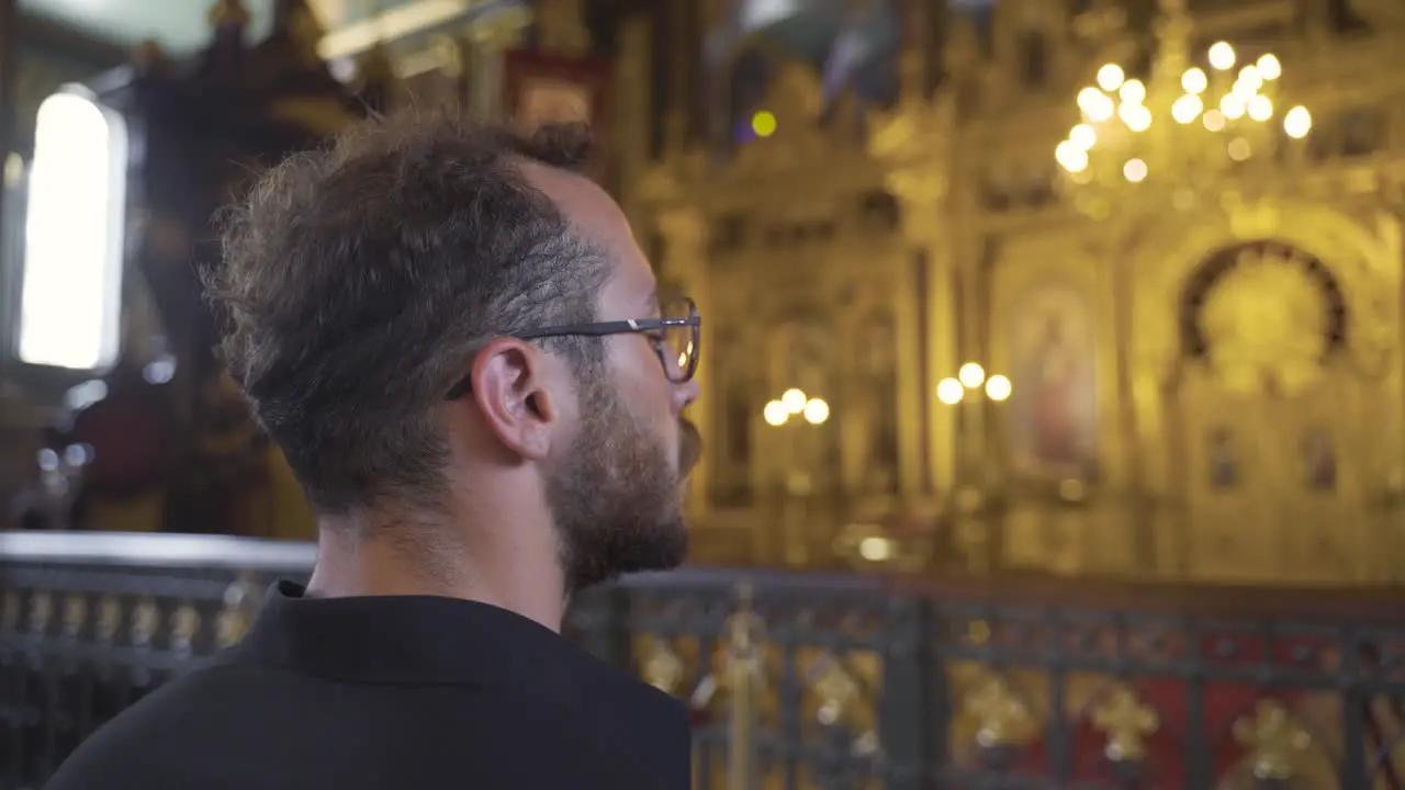 Pensive man inside the church