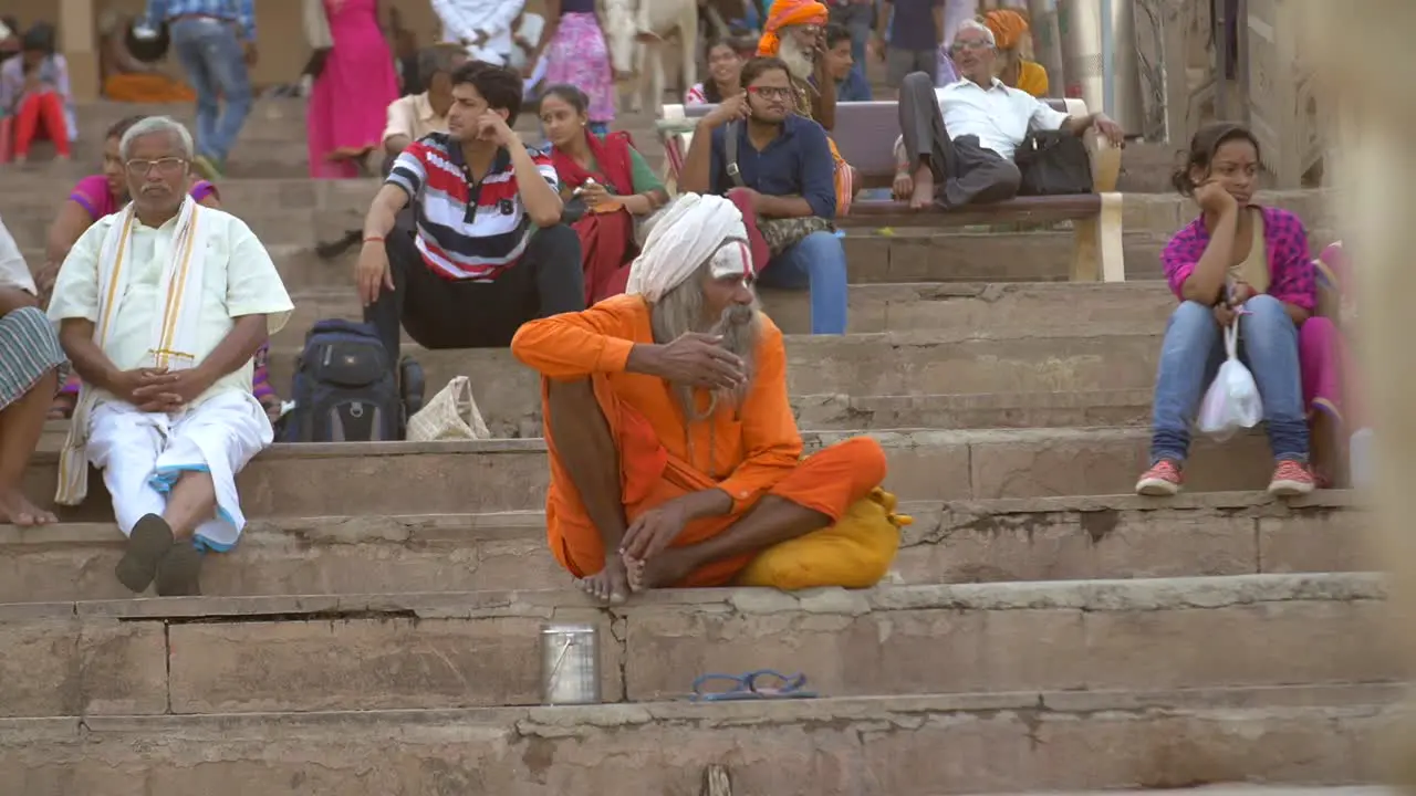 Indian Sadhu Sitting on Ganges Ghat