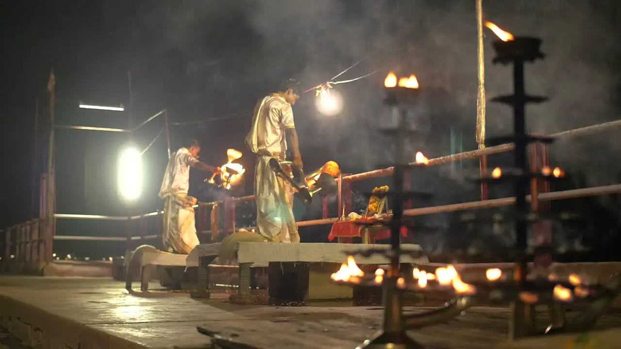 Focus-Pull on Ganga Aarti Ceremonial Candelabras