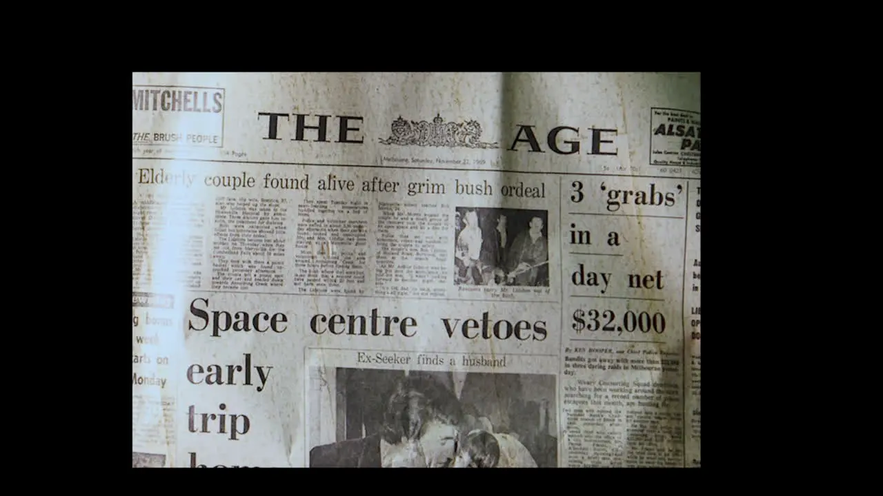 Extra extra spinning newspaper editorial about Apollo twelve nineteen sixty nine the age