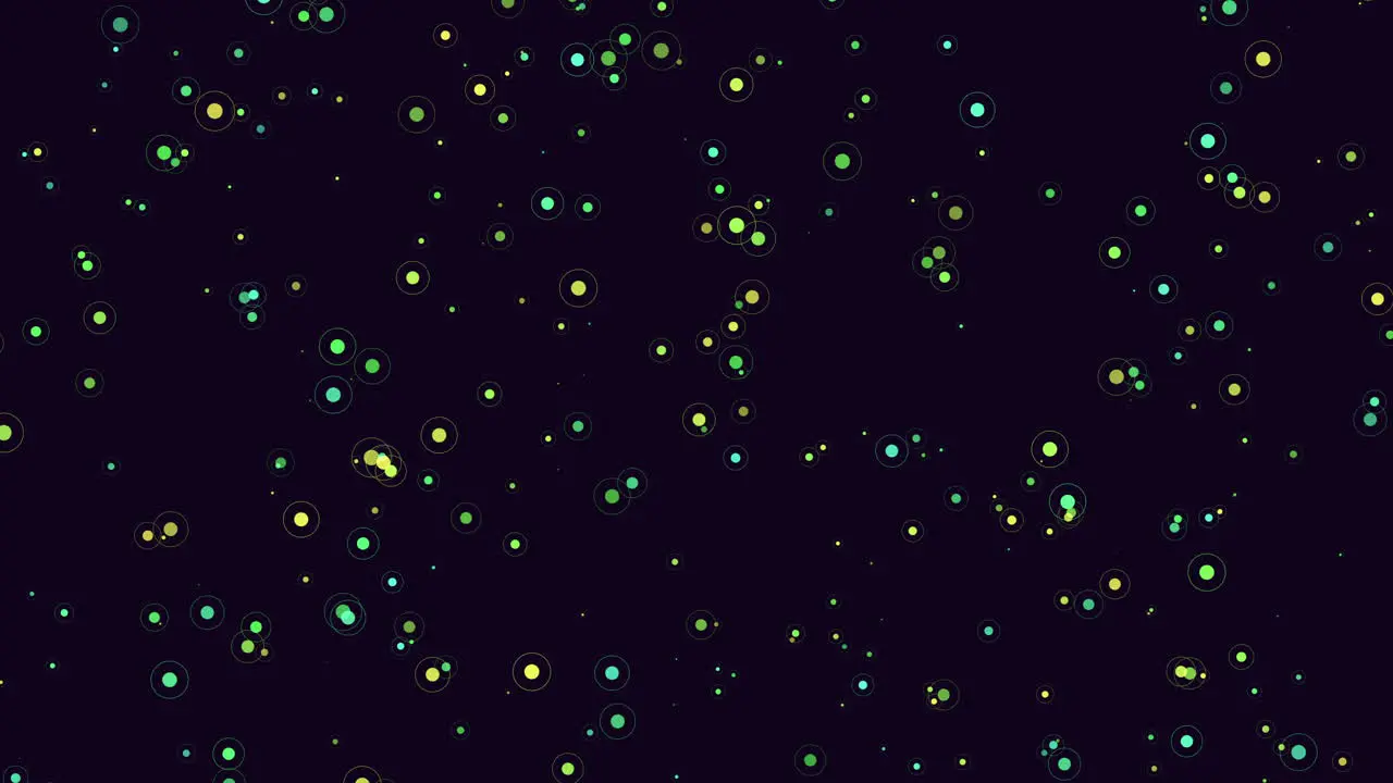 Fly colorful glitters with neon color in dark space