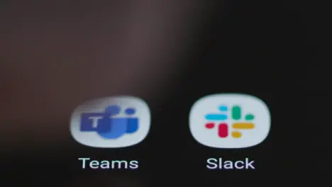 Close Up Shot of a Finger Tapping the Microsoft Teams App On Smartphone