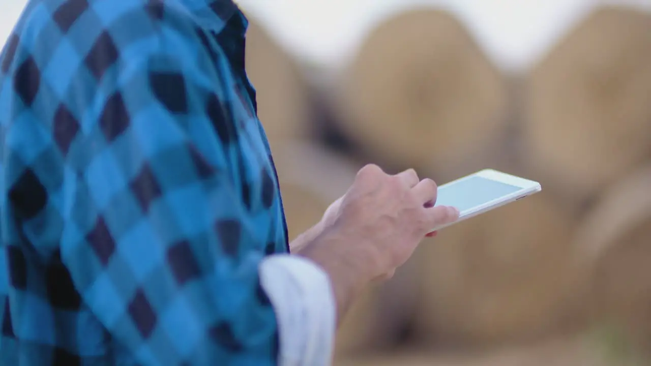 Midsection Of Male Researcher Using Digital Tablet