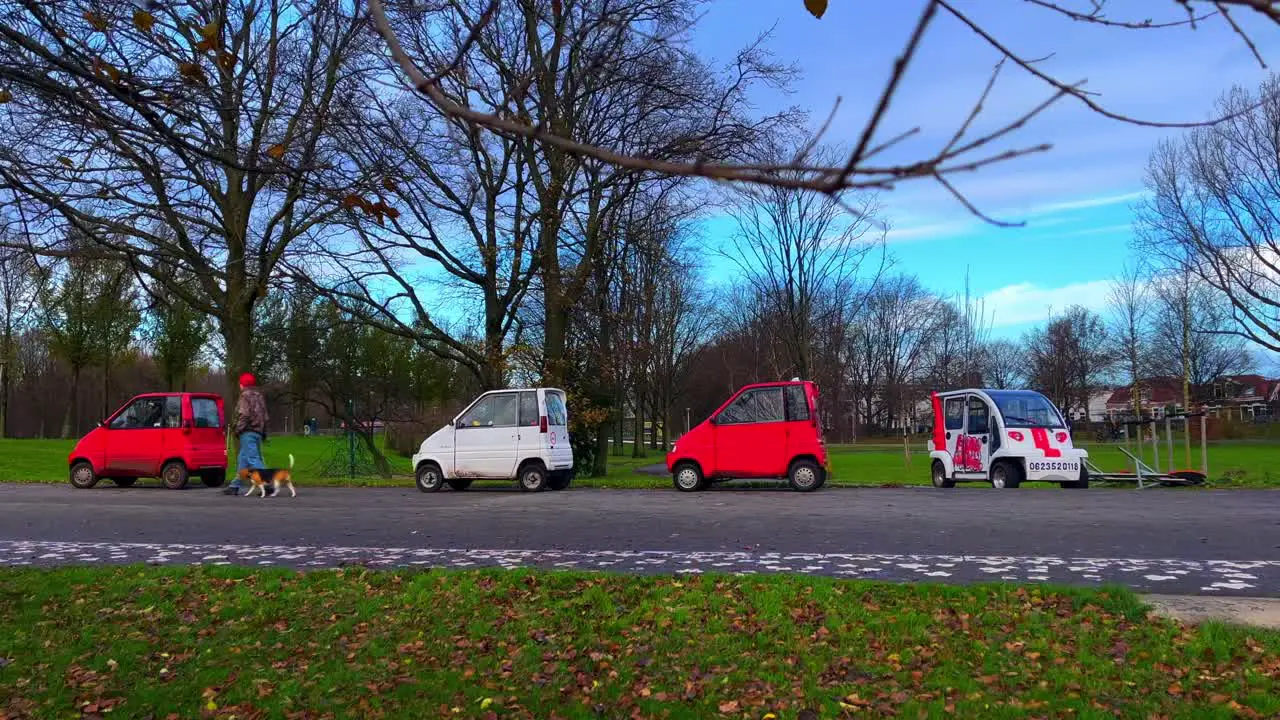 Line of Cantas cars for disables driver parked in Noorderpark Amsterdam