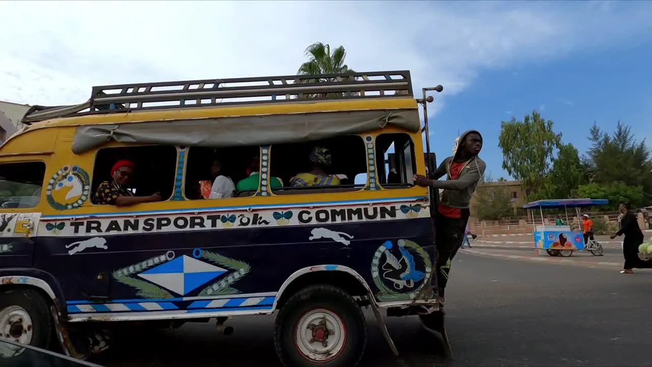 Locals Riding In Traditional Public Transport Bus In Dakar Senegal