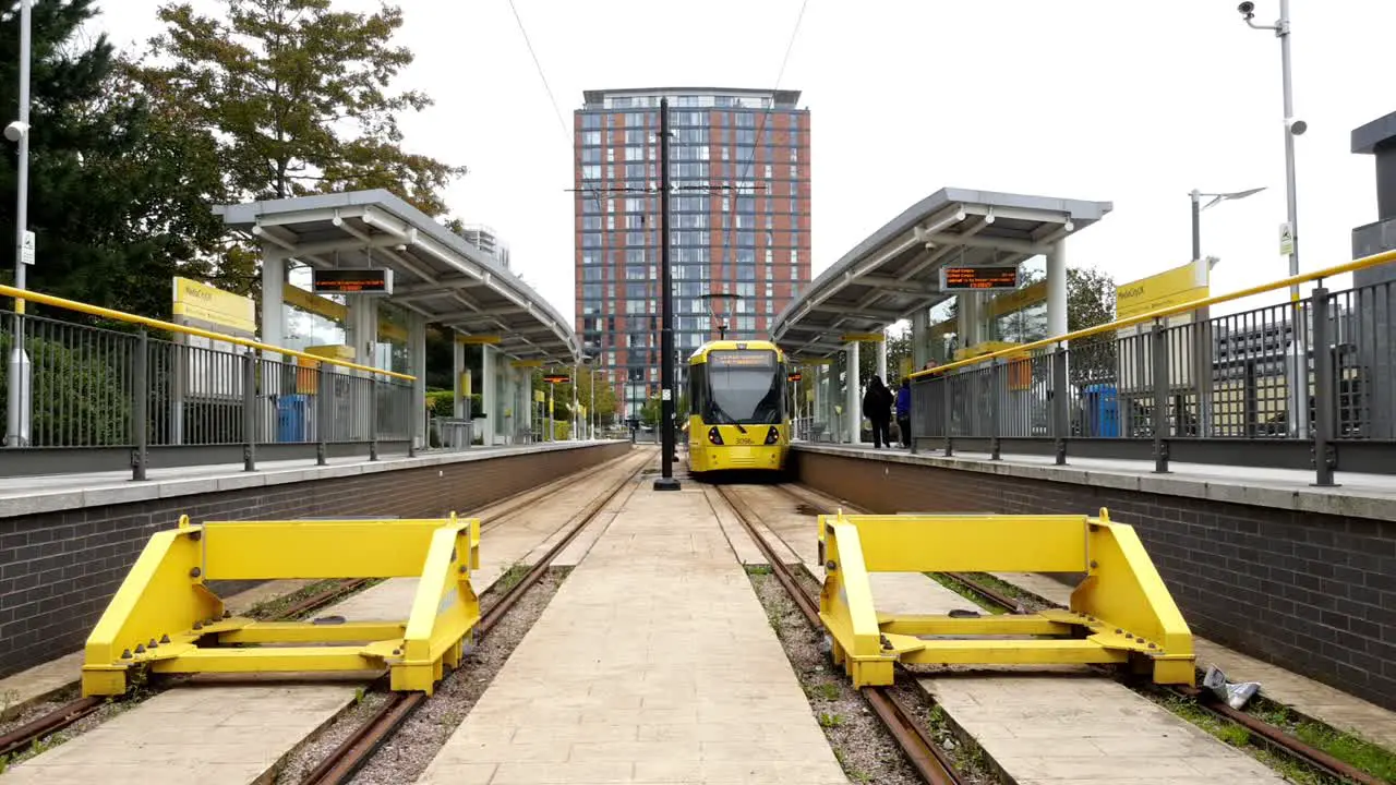 One of Manchester s iconic yellow trams departing from the Media City UK station