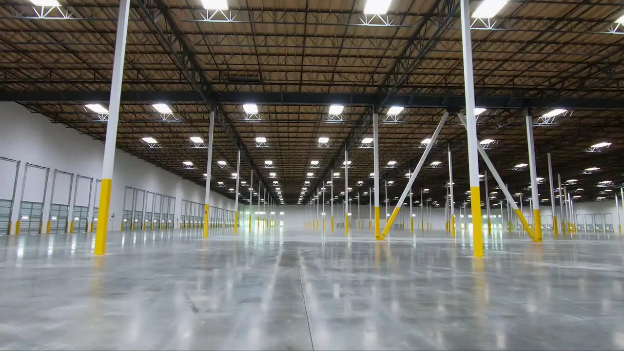 Internal moving shot inside a new warehouse ready for new tenants