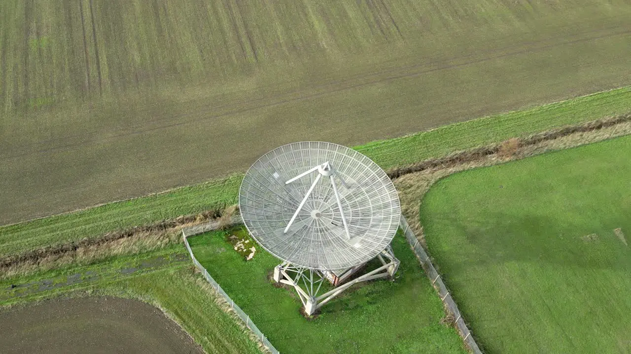 Aerial orbit over the radiotelescope antenna at the Mullard Radio Astronomy Observatory