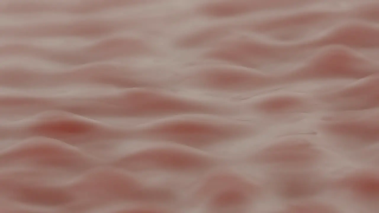 Red liquid forming strange rhythmic patterns and structures