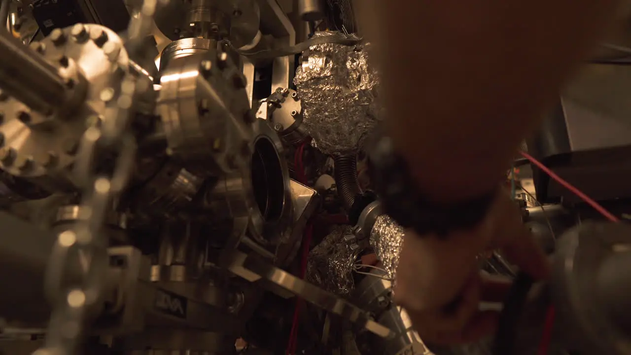 Technician working on the reactor in the laboratory