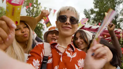 Friends in a music festival outdoors