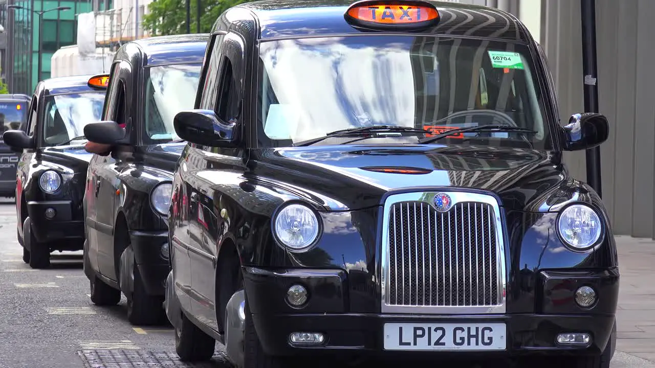 British taxi cabs line up on a street