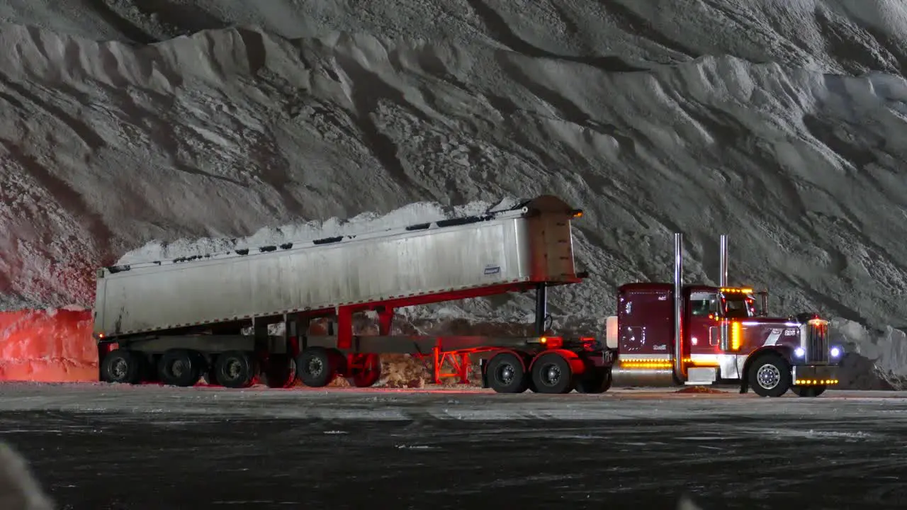 Truck unloading snow off the highways of the city of Montréal Canada