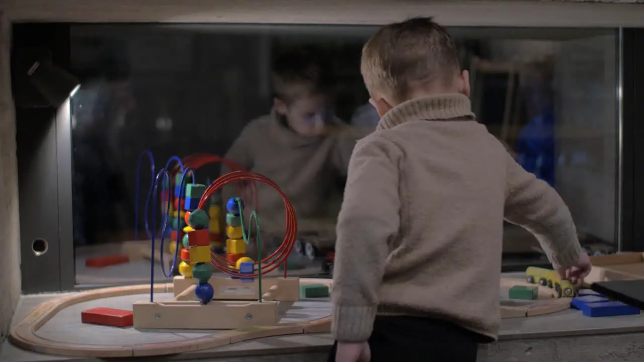 Child playing with toys at home