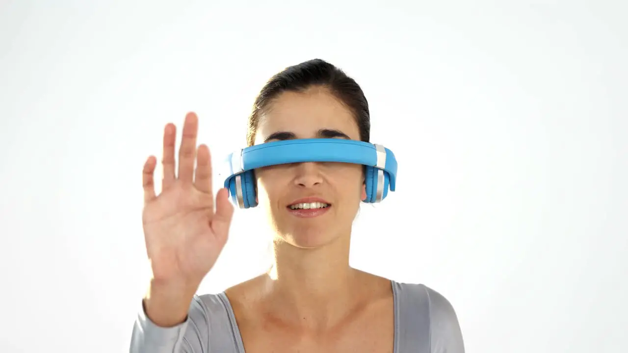 Woman pretending to use visual reality headset