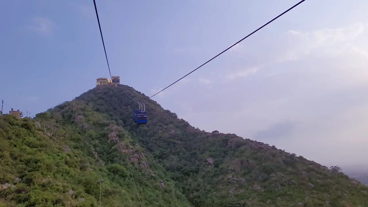 ropeway view moving towards mountain top station from flat angle video is taken at pushkar rajasthan india on Aug 19 2023