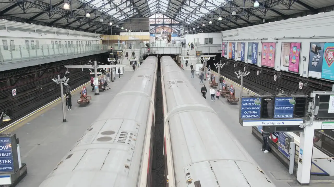 London District line underground trains leaving Earls Court station shot from above