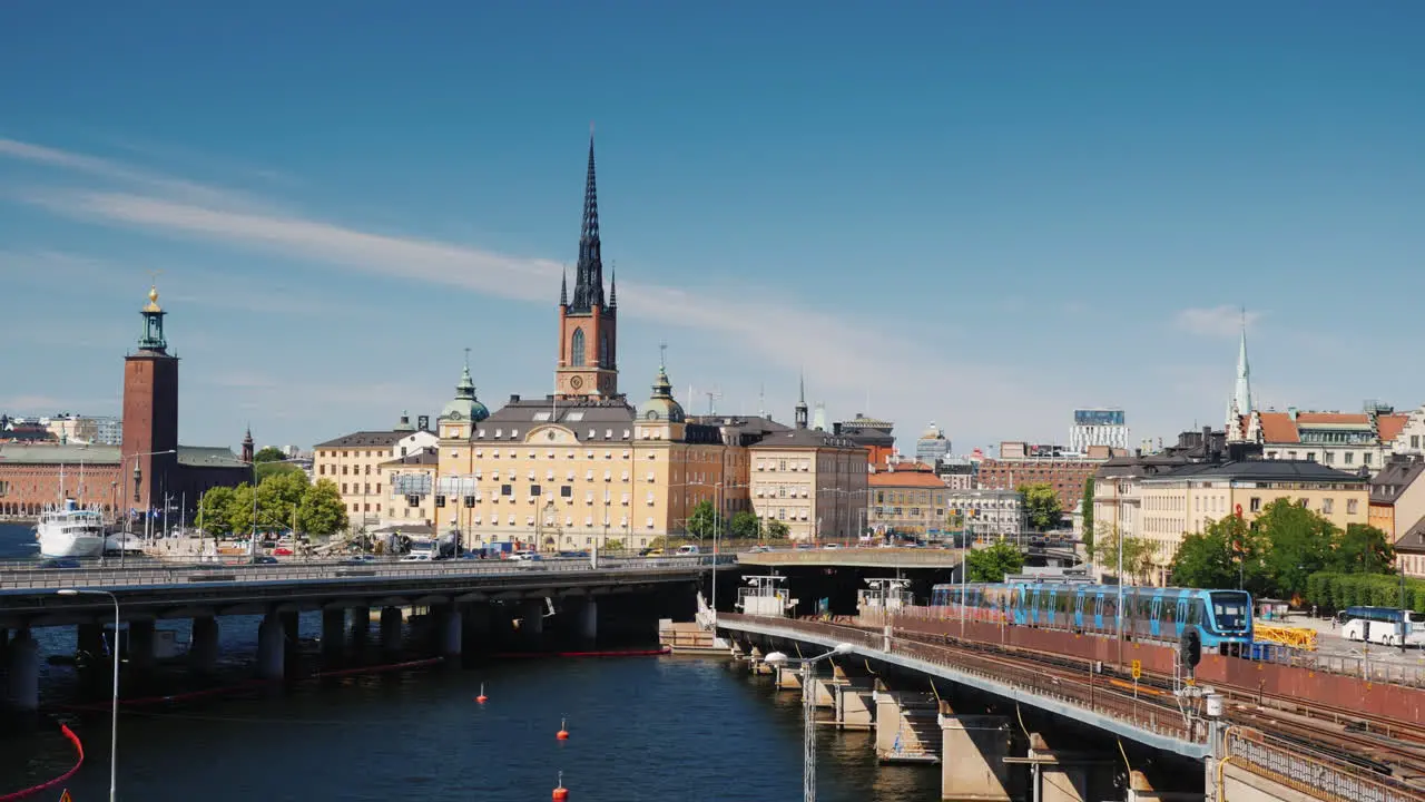 The City Line Of Stockholm In The Foreground The Train Passes Transport In The Capital Of Sweden