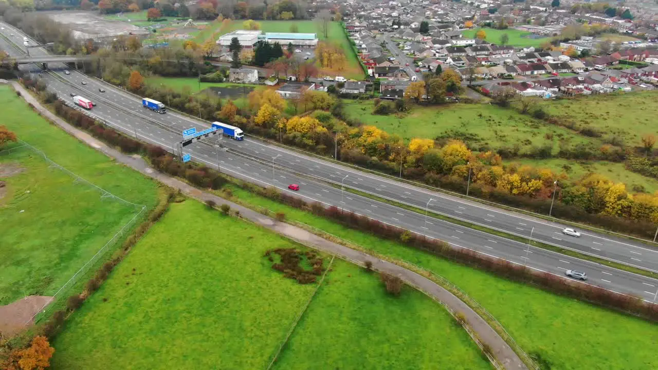 Aerial view across Lancashire countryside busy M6 motorway traffic England