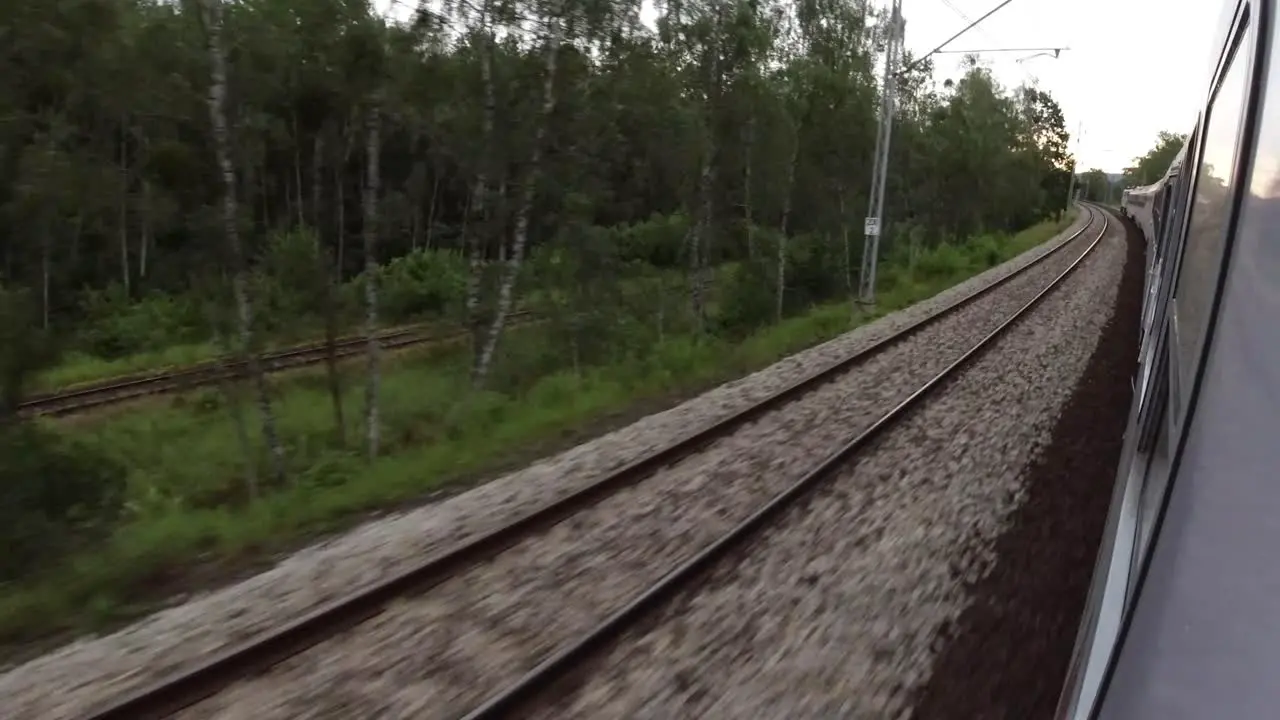 Looking out the window of a moving train