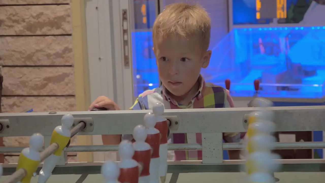 Little child and table football