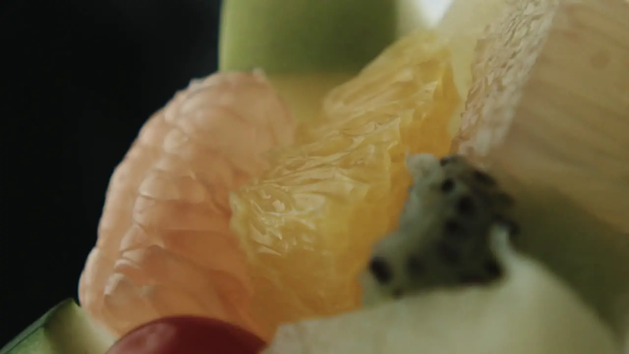 Slow-motion of White Smoke Hitting on Fruits