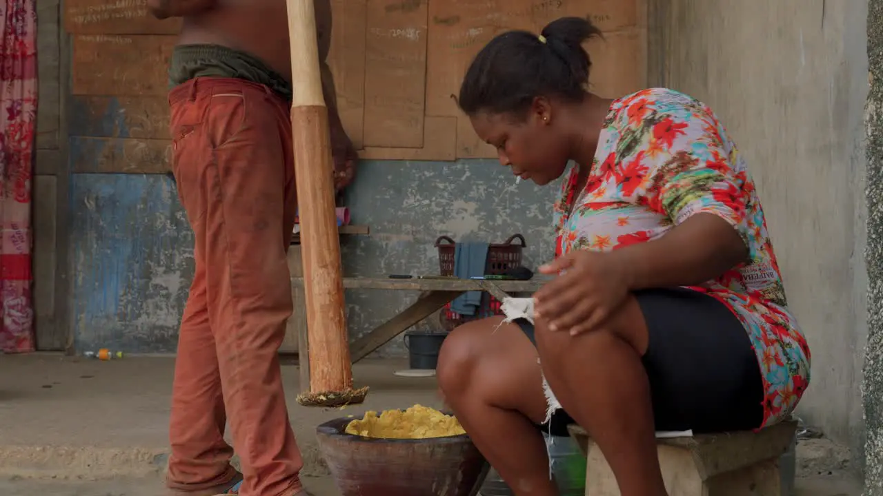 couple of black africa chef preparing fufu a pounded traditional meal from west africa