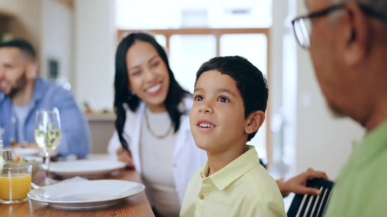 Happy family little boy and dining together