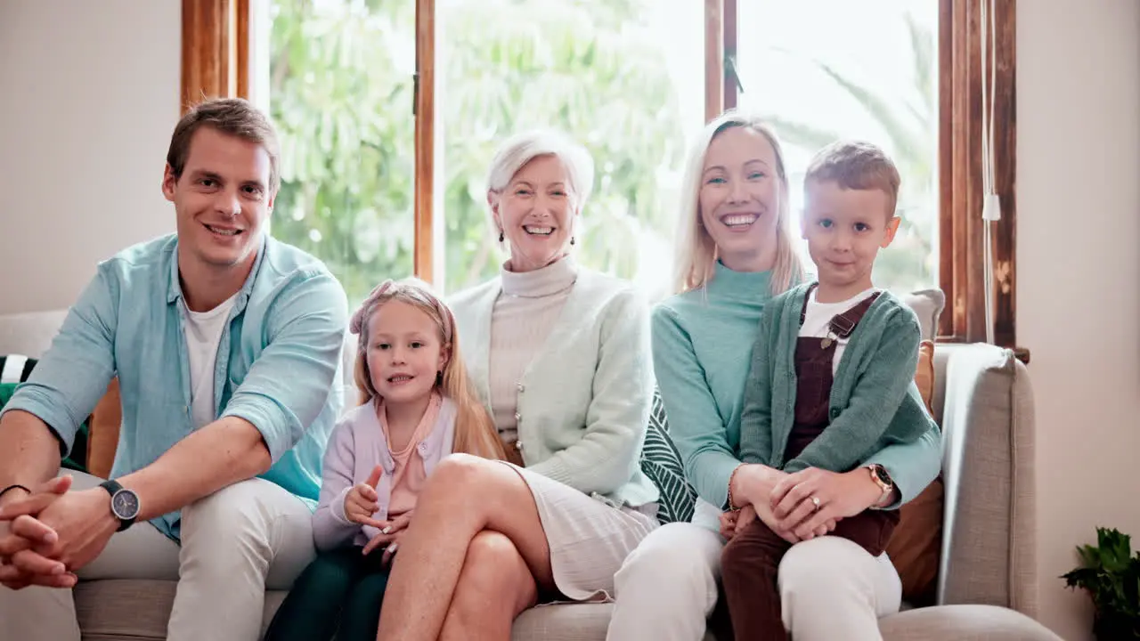 Family face and smile on sofa with love